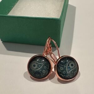 Handcrafted rose colored drop earrings.